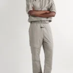 ESSENTIALS Fear of God Logo Appliqued Shell Trousers - Desert Taupe